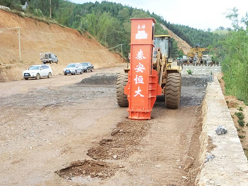 Rapid Impact Compaction installed on loader for construction Rapid Impact Compaction installed on loader for construction