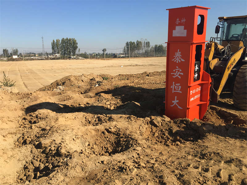 Installation of rapid impact compactor on loader for construction Installation of rapid impact compactor on loader for construction